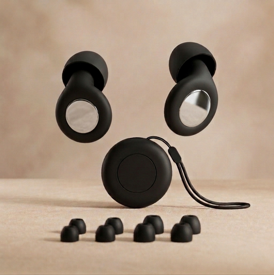 AURALIS premium reusable noise-reducing silicone earplugs in matte black with round carry case
